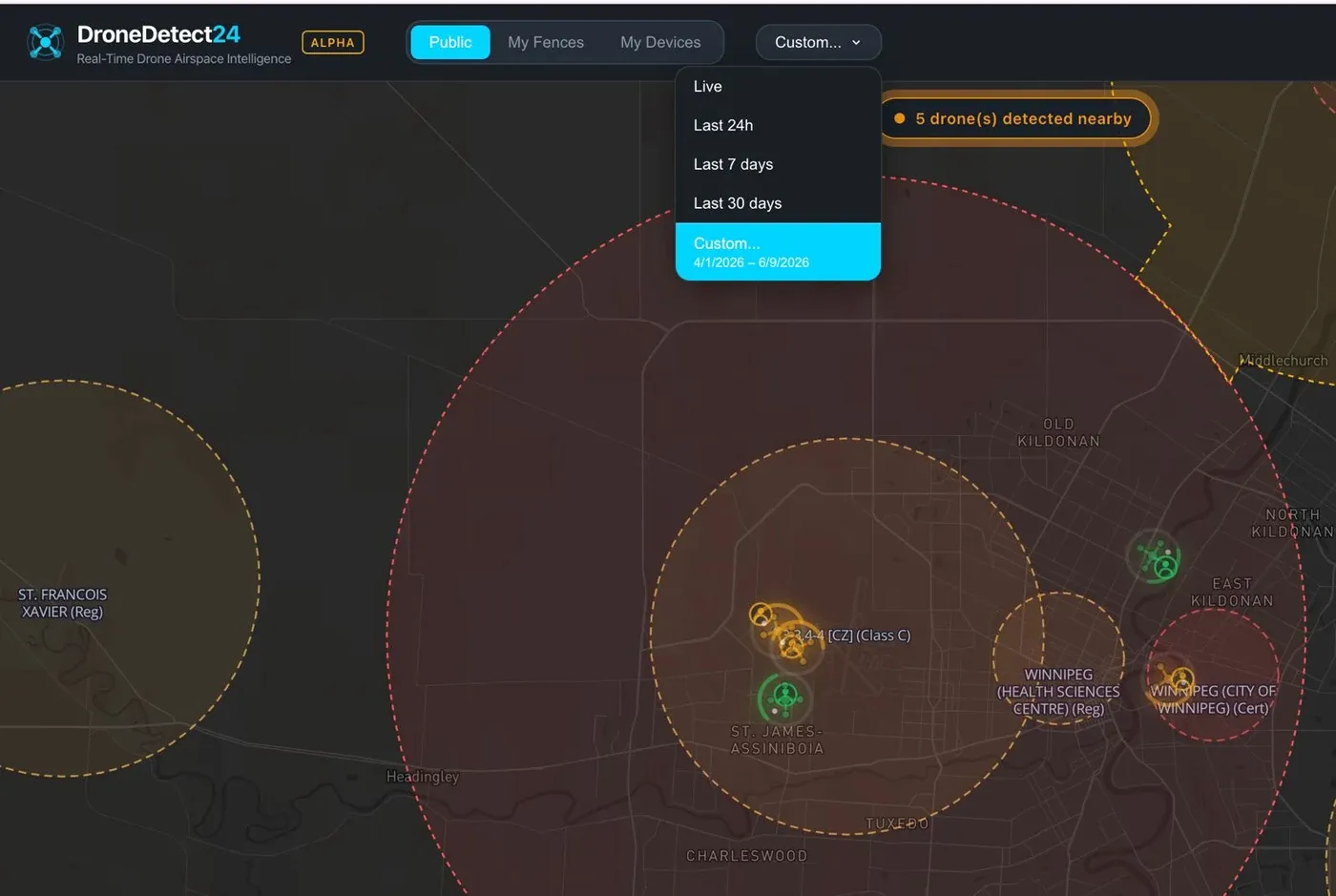 A DroneDetect24 map view showing live drone detections, geofences, and airspace zones over Winnipeg